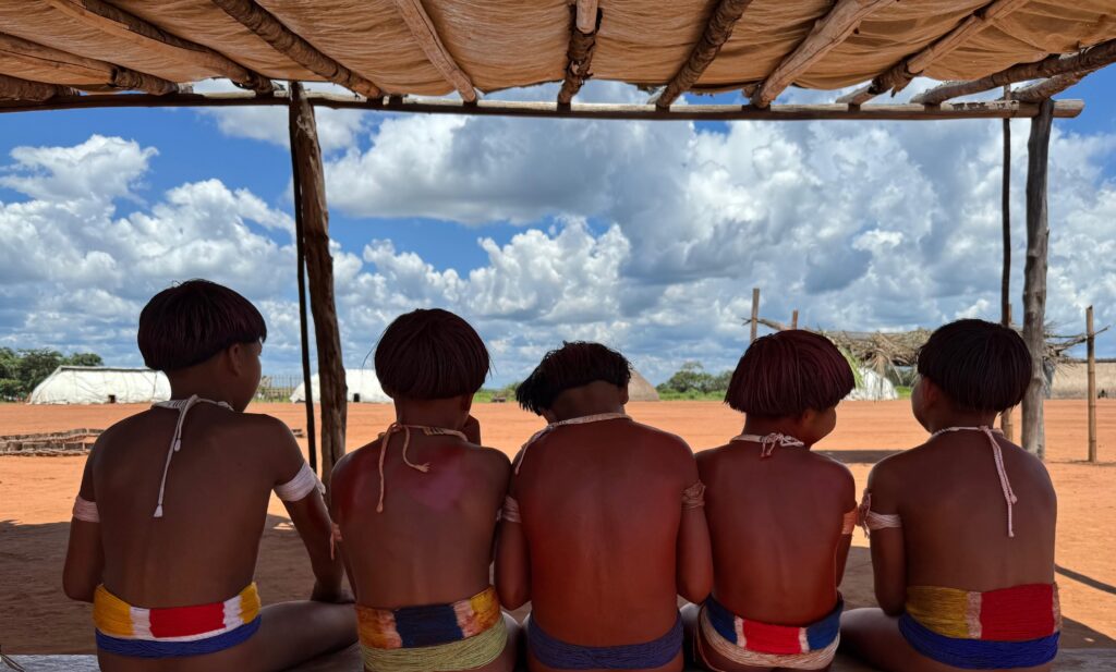 Children watching football in Xingu